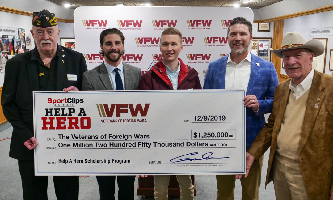 Sport Clips presents $1.25 million dollar donation for veteran scholarships 