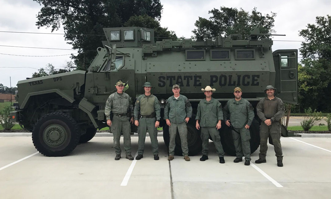 Six members of the Texas State Patrol prepare for Hurricane Harvey relief efforts