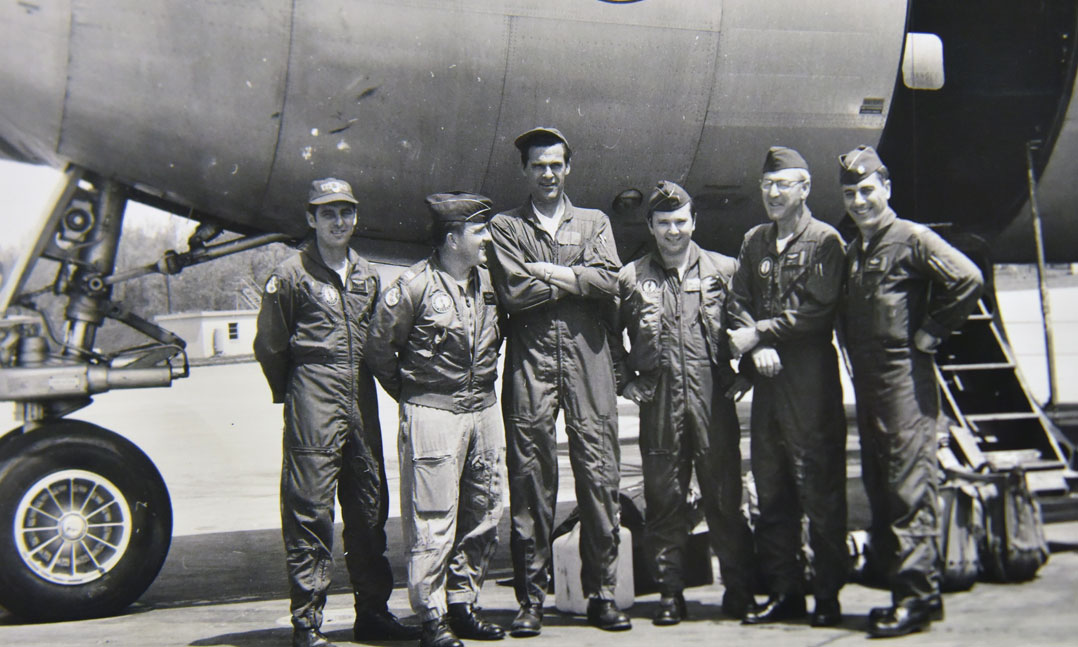 Members of the New York Air National Guard prepare a C-97 Stratofreighter for a holiday gift delivery to U.S. GIs in Vietnam