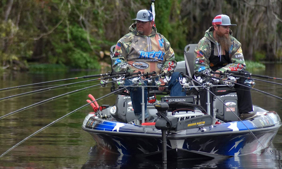 Justin Walkabout and Derrick Brooks fish with the Save The 22 Fishing Team to fight veteran suicide