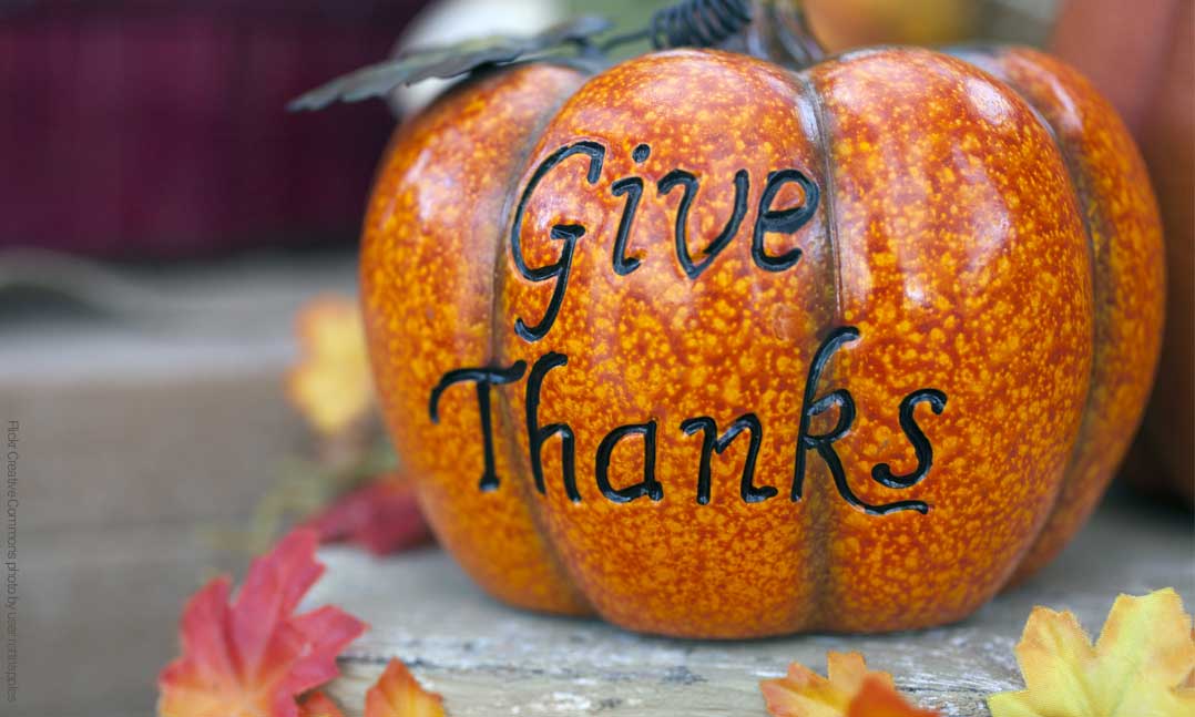 Give Thanks message on an orange pumpkin