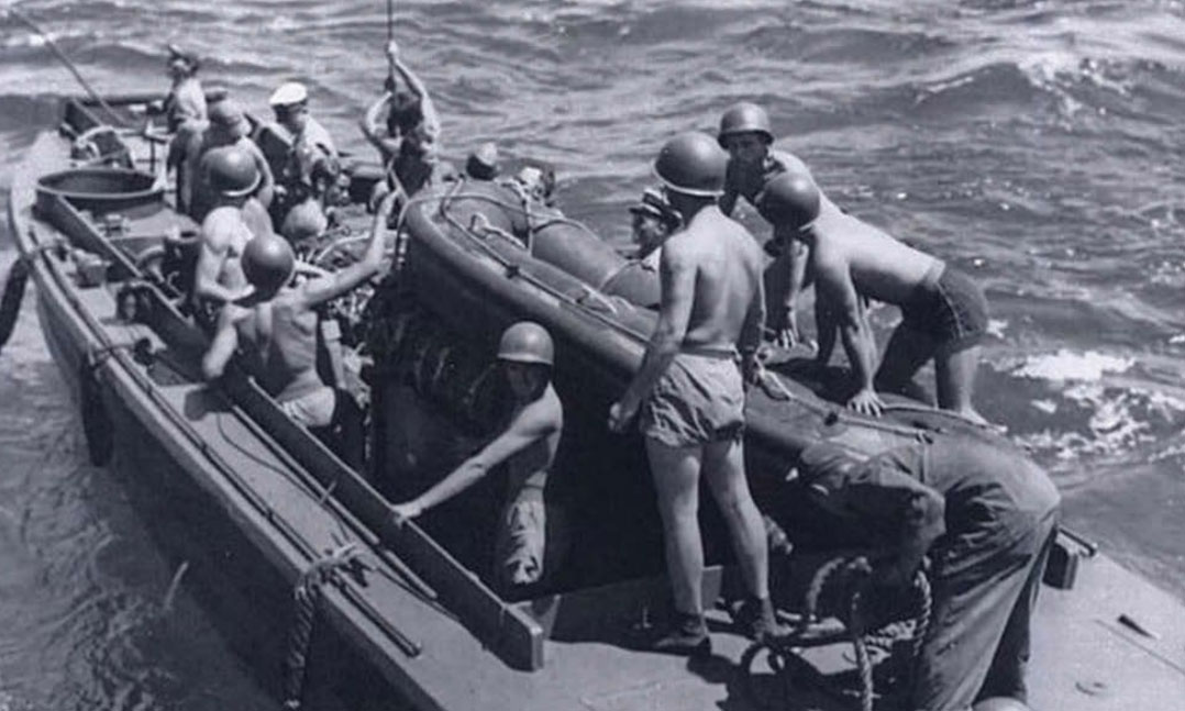 https://vfw-org-hqagarhxahbybyd9.z01.azurefd.net/-/media/VFWSite/Images/Media-and-Events/Archive/2020/2/Frogmen-Were-the-First-on-Iwo-Jima.jpg?d=20200211T182408Z&v=1