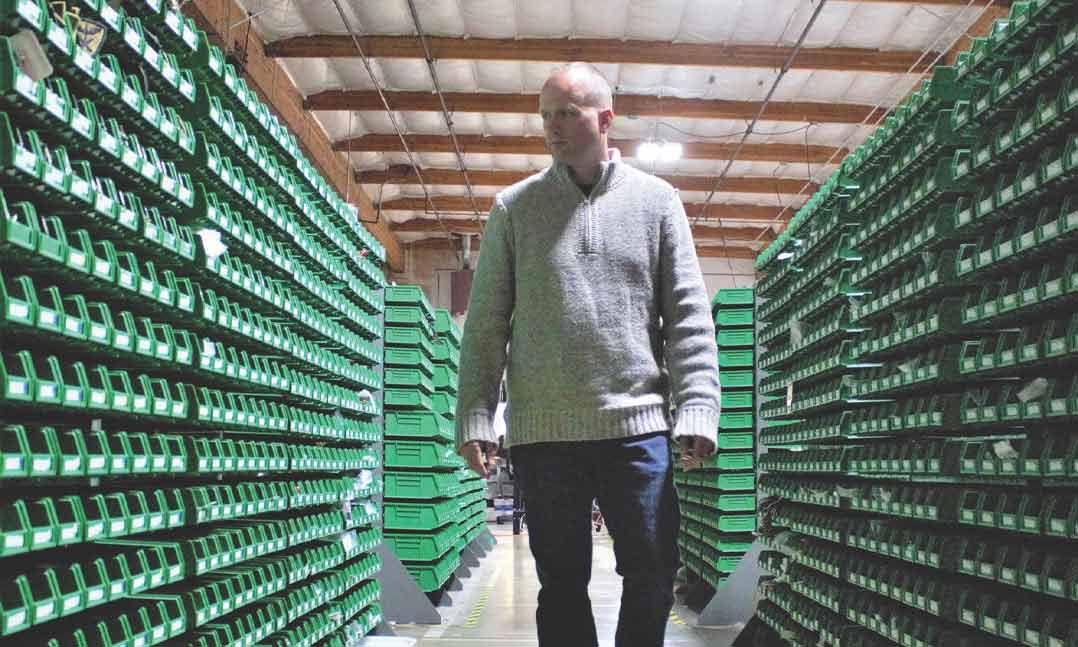 Man walking through a warehouse