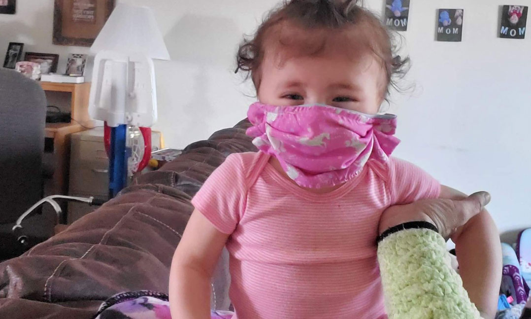 Baby wearing a VFW-made face mask during the COVID-19 pandemic of 2020