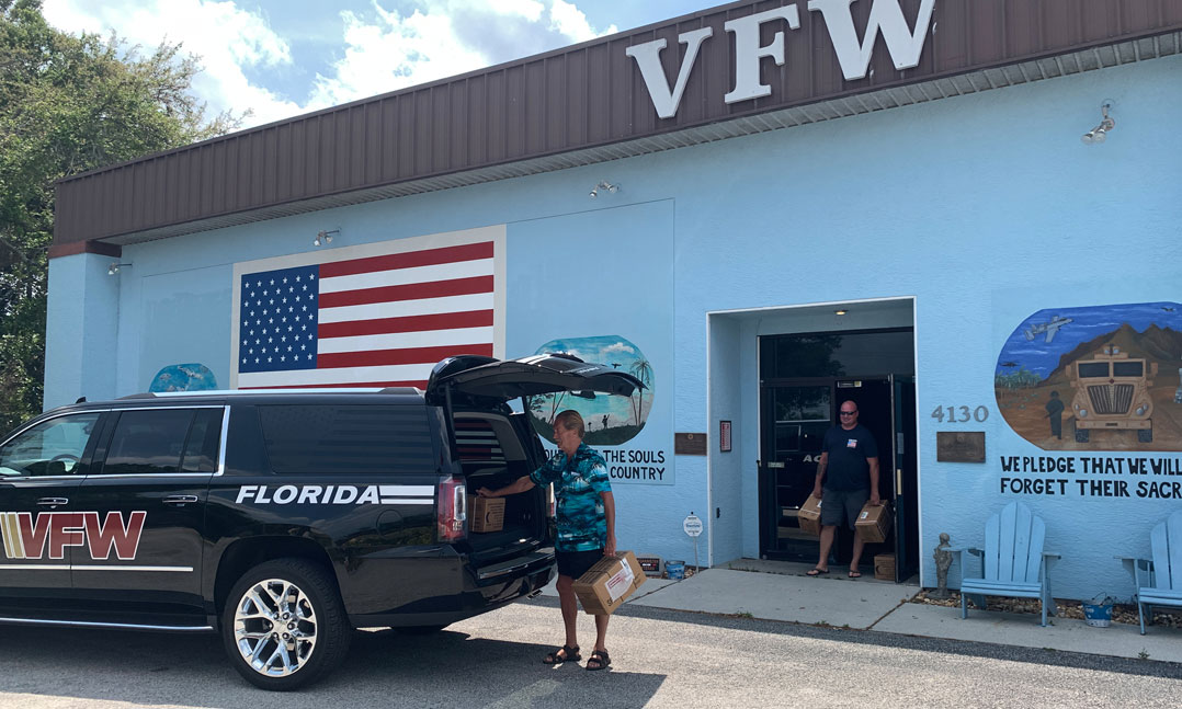 VFW members load up supplies for veterans and people during the COVID-19 pandemic