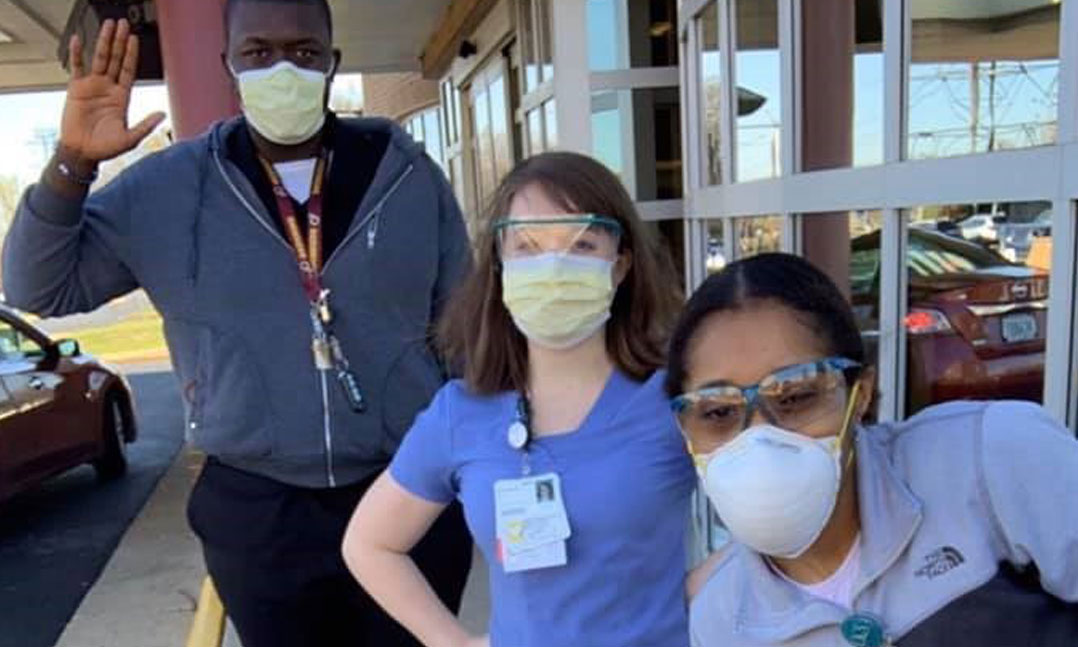 Medical workers on the COVID-19 front line wear masks provided by their local VFW Post