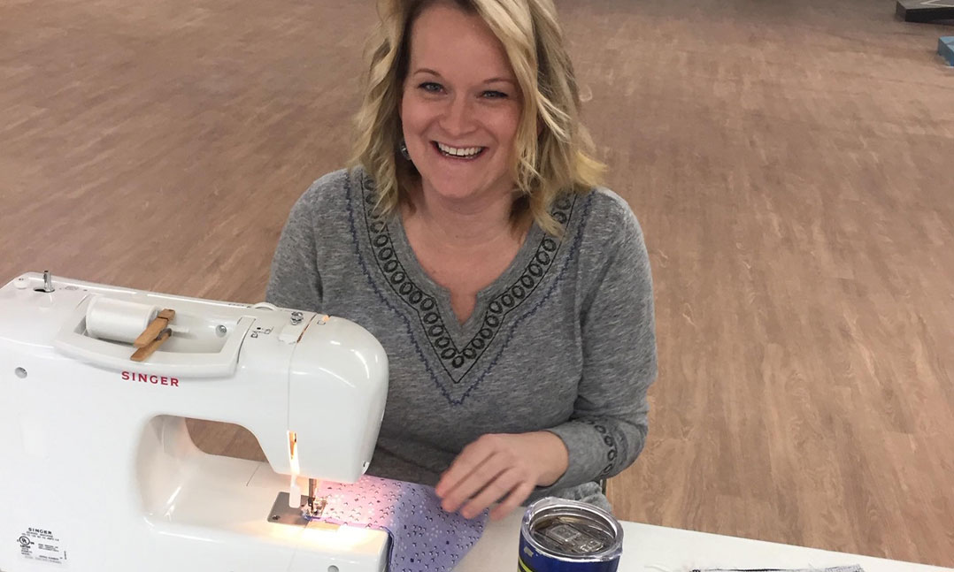 VFW Auxiliary member sews a face mask for front line workers