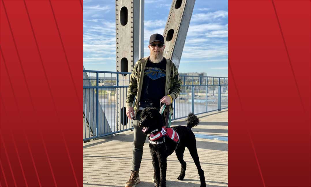 Veteran Dustin Brown and his service dog, Sophie