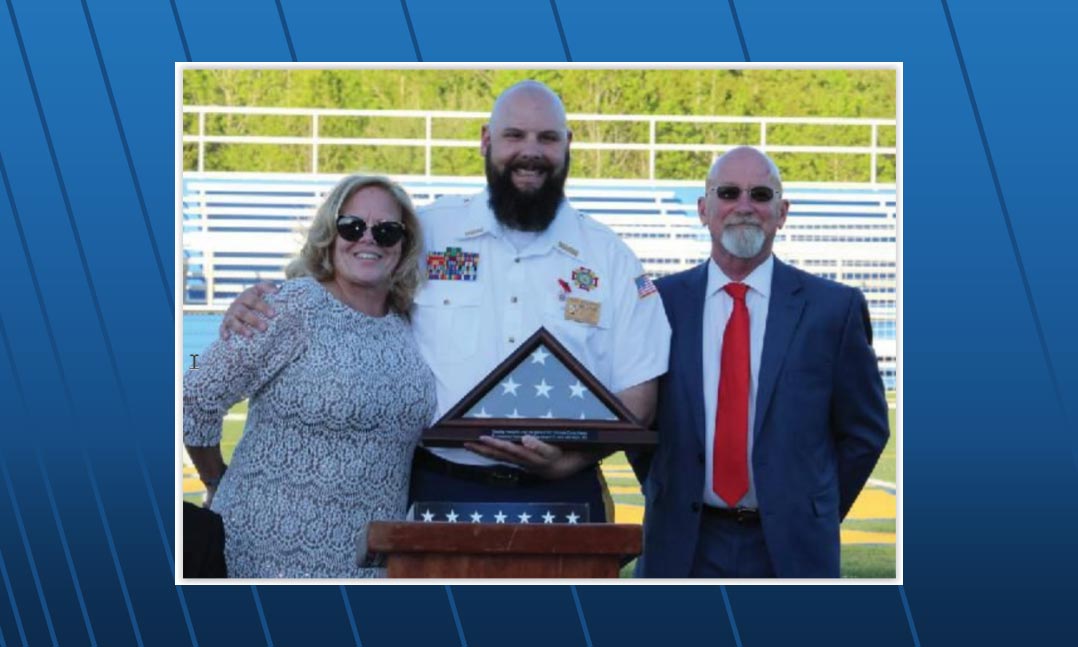 VFW Post 12202 Commander Alex McKenna, center, stands with Christine and Vic Mason on May 1 in King George, Va., at the Post’s institution ceremony. 