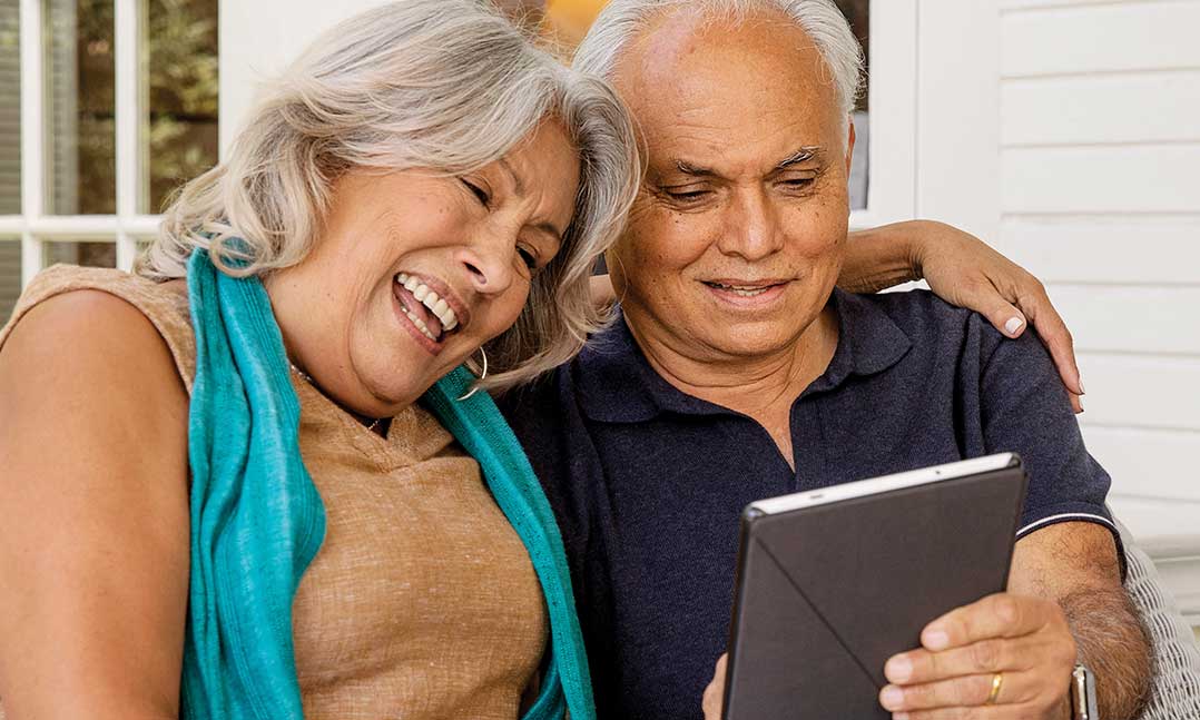 Smiling older woman and man