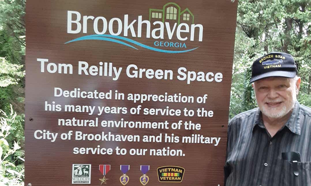 Tom Reilly, a Vietnam War veteran and member of VFW Post 10822 in Dunwoody, Ga., walks through the forest northeast of Atlanta