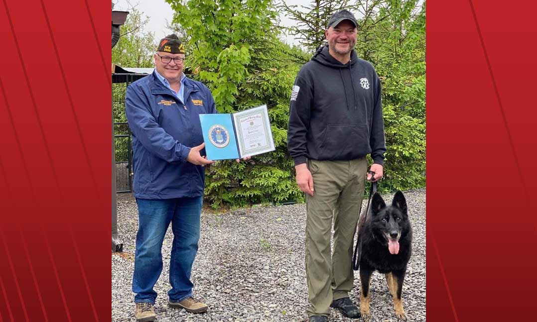 VFW Commander Fritz Mihelcic and Project K-9 Hero Foundation Jason Johnson with military working dog Rosso