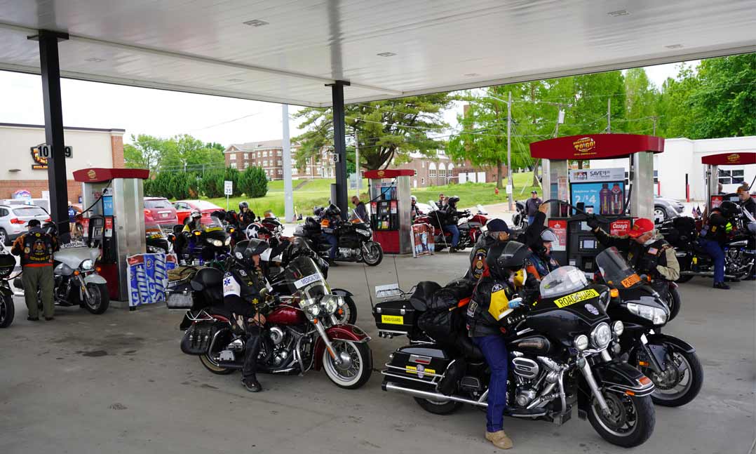 Motorcyclists fuel up at a gas station in Concordia, Missouri