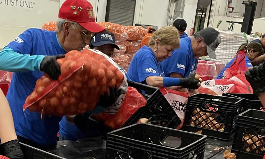 VFW members sort food for VFW Day of Service