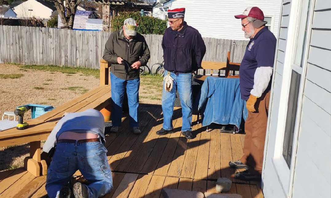 VFW Post works on a veterans home