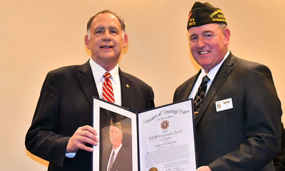 VFW National Commander Tim Borland (right) presents Sen. John Boozman with the 2023 VFW Congressional Award