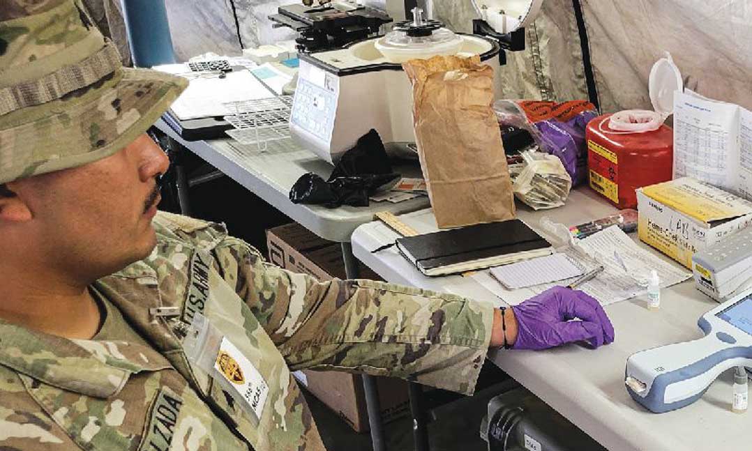 Army solider giving blood test for TBI