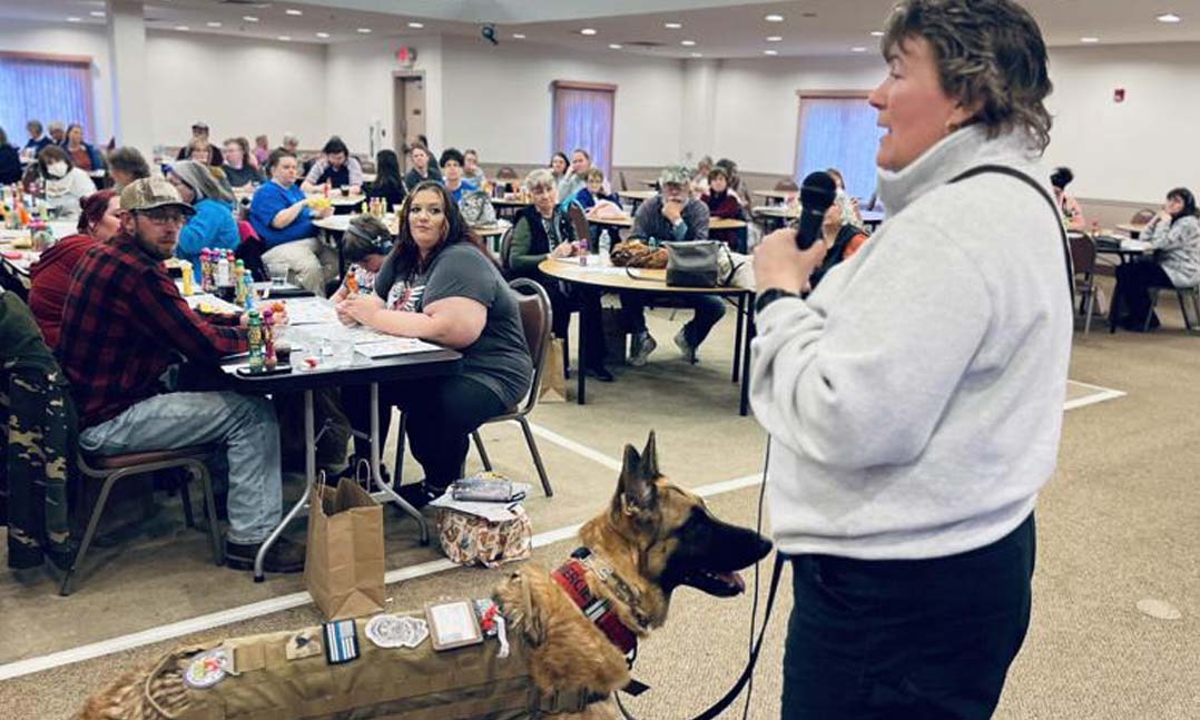 Executive director of Vermont Paws & Boots, Michelle LeBlanc talked about the program with the guests at VFW Post 1034