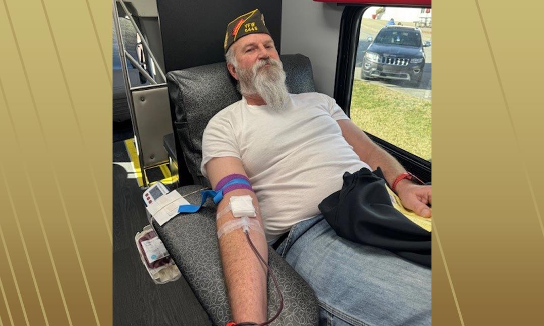 VFW Post 6445 Commander Erik Averill relaxes as he donates blood in January at VFW Post 6445 in Harlem, GA