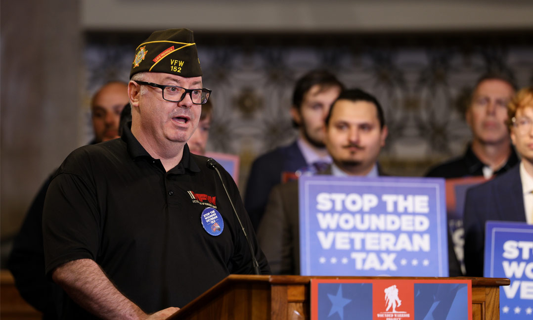 VFW member Pat Murray speaks during a Major Richard Star Act press event
