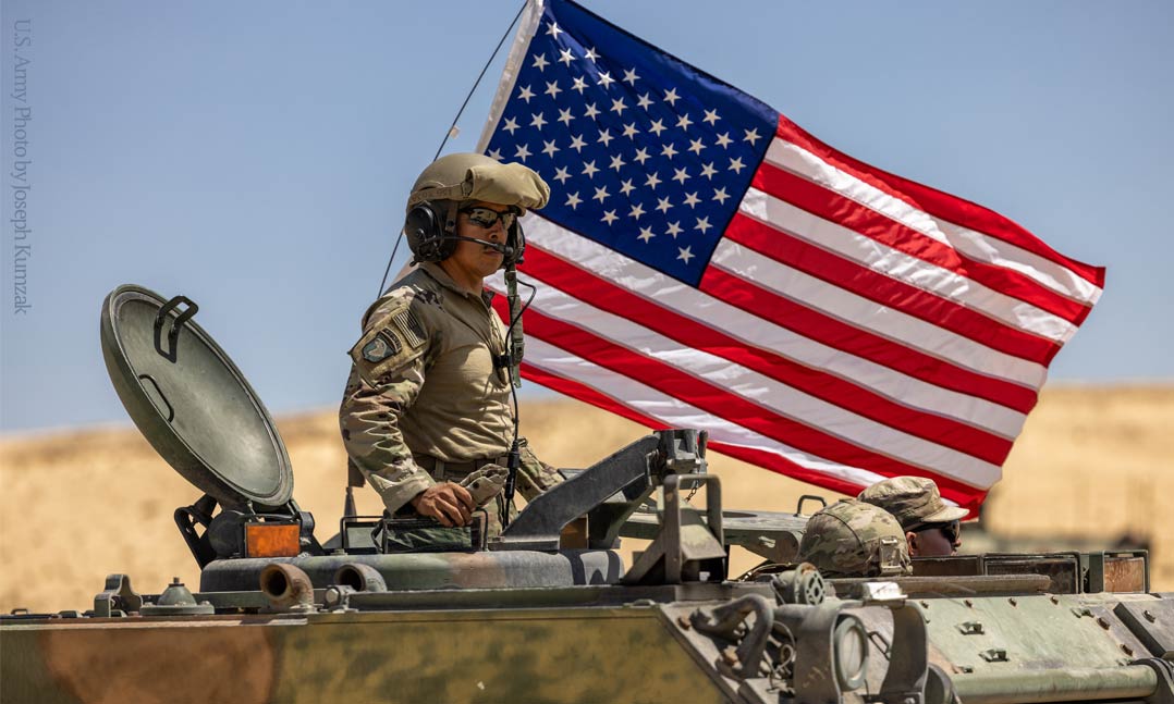 A U.S. Army soldier assigned to 3rd Squadron, 278th Armored Cavalry Regiment, Task Force Reaper, observes live fire training 